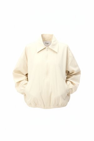 Luźna beżowa kurtka typu bomber zapinana na zamek